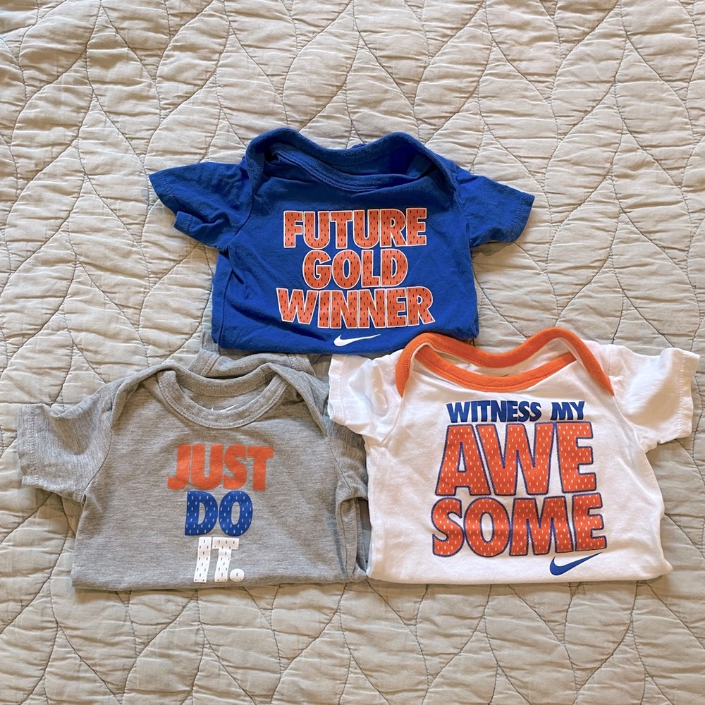 Nike baby onesies